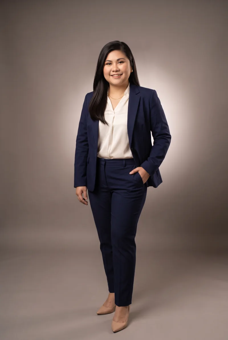 Janice Willa Francisco standing in a navy suit